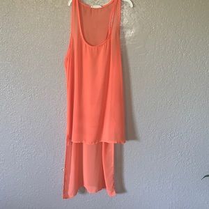 Orange sheer tank.